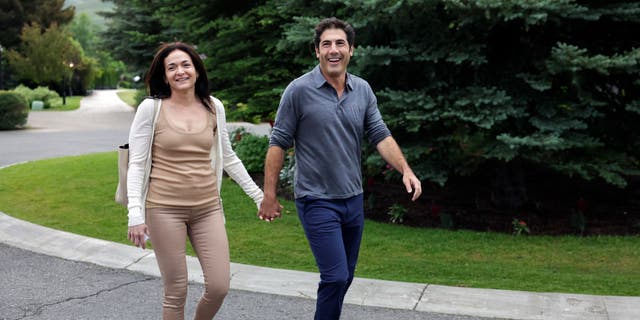 Sheryl Sandberg, outgoing Chief Operating Officer of Meta, and her partner Tom Bernthal walk to a morning session during the Allen & Company Sun Valley Conference on July 06, 2022, in Sun Valley, Idaho.