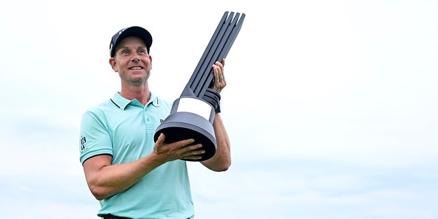 Henrik Stenson of Majesticks GC poses with the first-place individual trophy after winning the LIV Golf Invitational-Bedminster at Trump National Golf Club on July 31, 2022, in Bedminster, New Jersey.