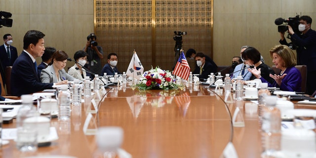 House Speaker Nancy Pelosi, D-Calif., far right, talks with South Korea's National Assembly Speaker Kim Jin-pyo, far left, during their meeting in the National Assembly on August 4, 2022 in Seoul, South Korea.