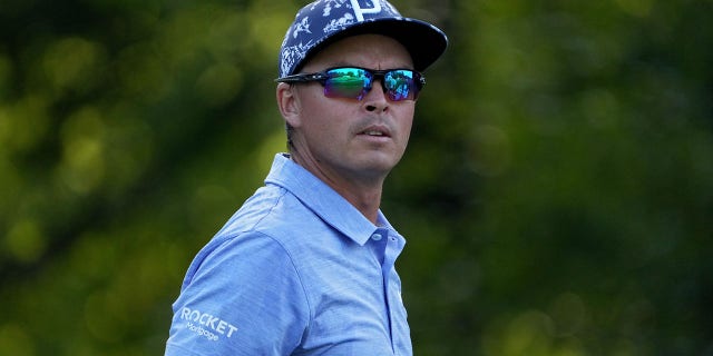 Rickie Fowler walks off the 13th tee at the Wyndham Championship at Sedgefield Country Club on August 5, 2022 in Greensboro, North Carolina.