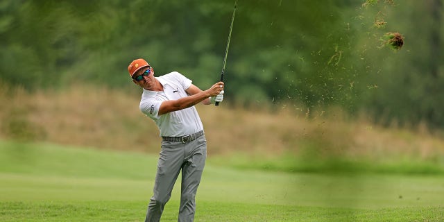 Rickie Fowler plays the second shot during the first round of the FedEx St. Jude Championship at TPC Southwind on August 11, 2022 in Memphis, Tennessee.