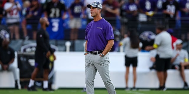 Baltimore Ravens head coach John Harbaugh looks on before the game against the Tennessee Titans at M&T Bank Stadium on August 11, 2022 in Baltimore, Maryland.