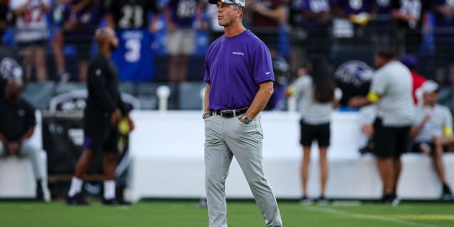 Baltimore Ravens head coach John Harbaugh looks on before the game against the Tennessee Titans at M&T Bank Stadium on August 11, 2022 in Baltimore, Maryland.