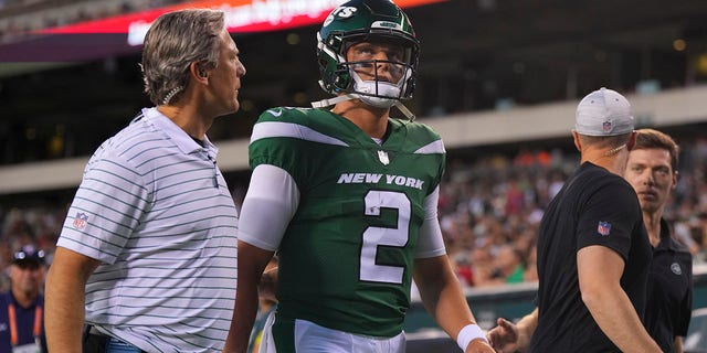 Zach Wilson (2) of the New York Jets walks to the locker room after an injury against the Philadelphia Eagles in the first half of a preseason game at Lincoln Financial Field in Philadelphia Aug. 12, 2022.