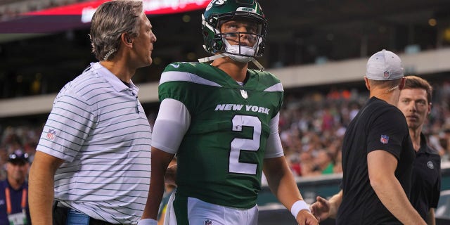 Zach Wilson (2) of the New York Jets walks to the locker room after an injury against the Philadelphia Eagles in the first half of a preseason game at Lincoln Financial Field in Philadelphia Aug. 12, 2022.