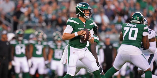 Zach Wilson (2) of the New York Jets looks to pass during a preseason game against the Philadelphia Eagles at Lincoln Financial Field in Philadelphia on Aug. 12, 2022. The Jets beat the Eagles 24-21. 