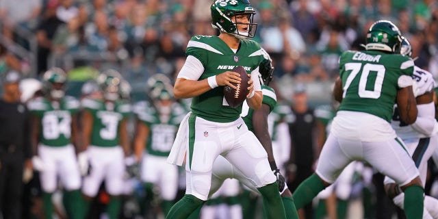 Zach Wilson (2) of the New York Jets looks to pass during a preseason game against the Philadelphia Eagles at Lincoln Financial Field in Philadelphia on Aug. 12, 2022. The Jets beat the Eagles 24-21. 