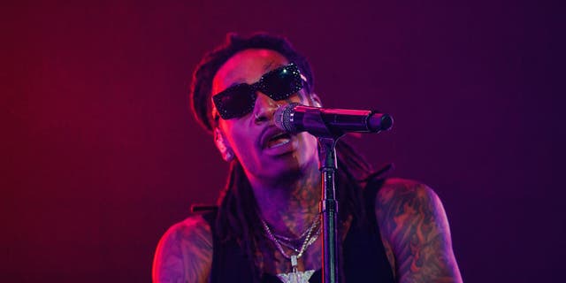 A crowd at a Wiz Khalifa concert in Indiana on Friday left the venue in a mass panic over fears of a possible disturbance, ending the performance.