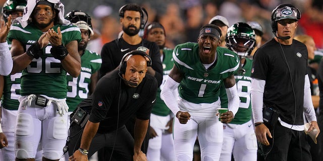 Head Coach Robert Saleh (hands on knees) of the New York Jets watches as Sauce Gardner (1) reacts behind him during the preseason game against the Philadelphia Eagles at Lincoln Financial Field in Philadelphia, Pennsylvania, on August 12, 2022.