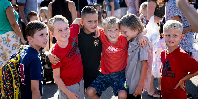 Students take a group photo during the first day of class at Melinda Heights Elementary School in Rancho Santa Margarita, Calif., on August 15, 2022. 