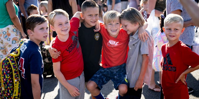 Students take a group photo during the first day of class at Melinda Heights Elementary School in Rancho Santa Margarita, Calif., on August 15, 2022. 