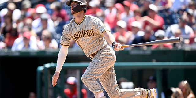 Wil Myers, #5 of the San Diego Padres, bats against the Washington Nationals at Nationals Park on August 14, 2022 in Washington, D.C. 