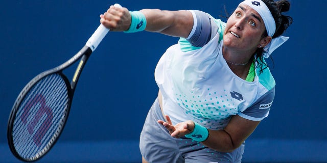 Ons Jabeur of Tunisia serves against Petra Kvitova of the Czech Republic in the third round of the women's singles at the Lindner Family Tennis Center on August 18, 2022 in Mason, Ohio. 