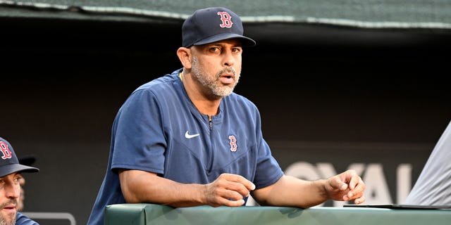 Alex Cora of the Boston Red Sox watches the game against the Orioles at Camden Yards on Aug. 20, 2022, in Baltimore.