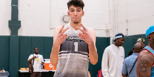 Chet Holmgren poses before the CrawsOver pro-am game at Seattle Pacific University on Aug. 20, 2022, in Washington state.