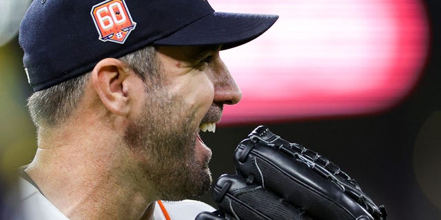 Justin Verlander, of the Astros, reacts during the fifth inning against the Minnesota Twins at Minute Maid Park on Aug. 23, 2022, in Houston.