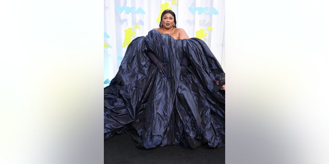 Lizzo told the audience to vote for change as she addressed the crowd at the VMAs on Sunday.