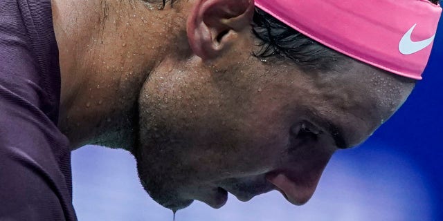 A drop of sweat falls down from Rafael Nadal of Spain as he prepares to serve against Rinky Hijikata of Australia in their Men's Singles First Round match during the 2022 U.S. Open Tennis Tournament at the USTA Billie Jean King National Tennis Center on Aug. 30, 2022.