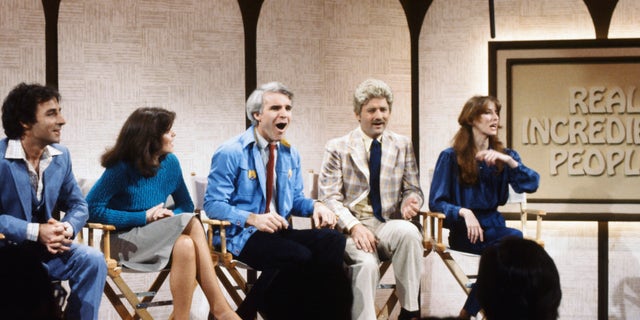 Steve Martin pictured in blue, on an episode of "Saturday Night Live" in 1980.