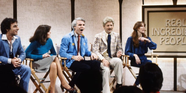 Steve Martin pictured in blue, on an episode of "Saturday Night Live" in 1980.