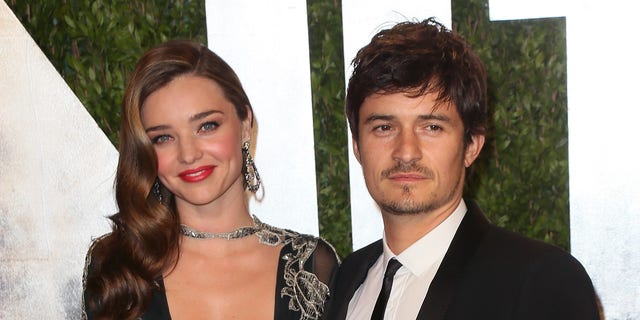 Miranda Kerr and Orlando Bloom (pictured in 2013) co-parent son Flynn together. Kerr has said she "adores" Katy Perry. 