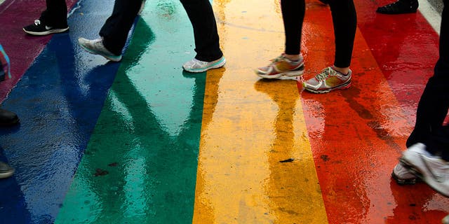 A man suspected of spray-painting a swastika on a rainbow crosswalk in Atlanta has been arrested.