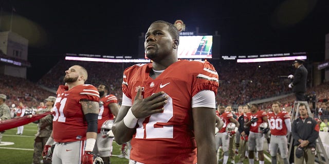 Ohio State QB Cardale Jones during the national anthem before a game against Minnesota at Ohio Stadium. Columbus.