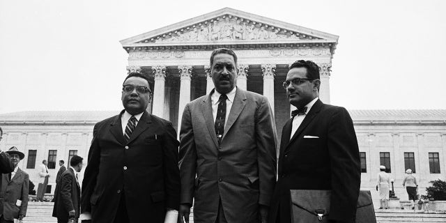 NAACP attorneys William T. Coleman Jr., chief counsel Thurgood Marshall (center) and Wiley A. Branton arrive to present arguments before a special session of the Supreme Court in the Little Rock school integration case on Aug. 28, 1958.