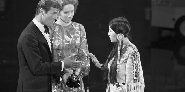 Sacheen Littlefeather is seen here during the exact moment she declined to accept Marlon Brando's Oscar for best actor, not even touching the statue. 