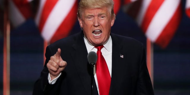 CLEVELAND, OH - JULY 21:  Republican presidential candidate Donald Trump delivers a speech during the evening session on the fourth day of the Republican National Convention.  (Photo by Alex Wong/Getty Images)