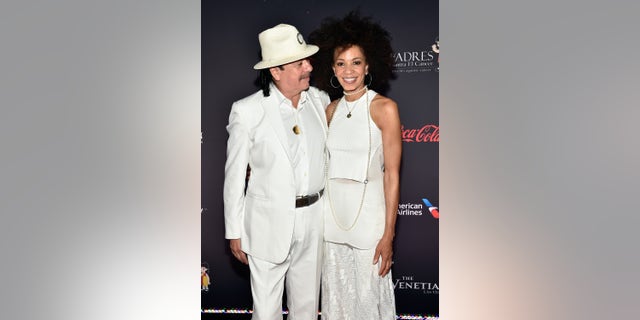 Carlos Santana's health was updated by his wife Cindy Blackman, pictured together here.