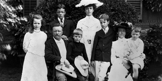A portrait of Theodore Roosevelt (1858-1919) with his family in 1903, prior to his election to president in 1904. His oldest child Alice (in white hat, center) stands at the rear.