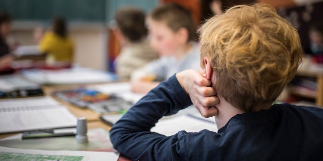 A student listens during a lesson in February 2017.