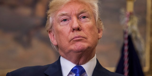 WASHINGTON, DC - AUGUST 2: (AFP OUT) U.S. President Donald Trump attends the announcement of the introduction of the Reforming American Immigration for a Strong Economy (RAISE) Act in the Roosevelt Room at the White House on August 2, 2017 in Washington, DC. The act aims to overhaul U.S. immigration by moving towards a "merit-based" system. (Photo by Zach Gibson - Pool/Getty Images)