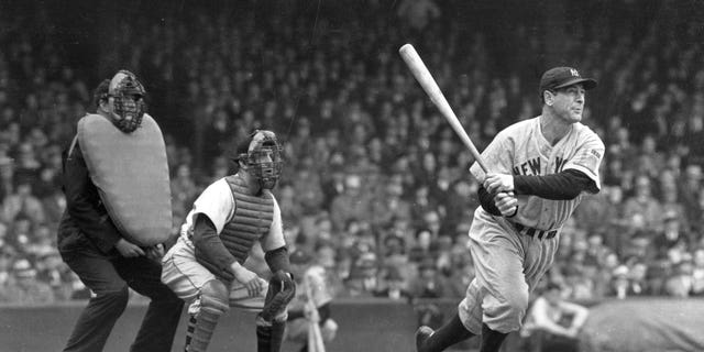 Lou Gehrig, the "Iron Horse," whacks a double into left center in a game at Yankee Stadium in 1938. The baseball legend is among those known to have frequented Palermo's Tavern when the N.Y. Yankees played in St. Louis.