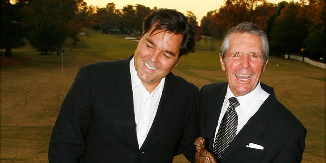 Gary Player and his son Mark Player are shown at East Lake Golf Club during The Tour Championship on November 1, 2006 in Atlanta, Georgia.