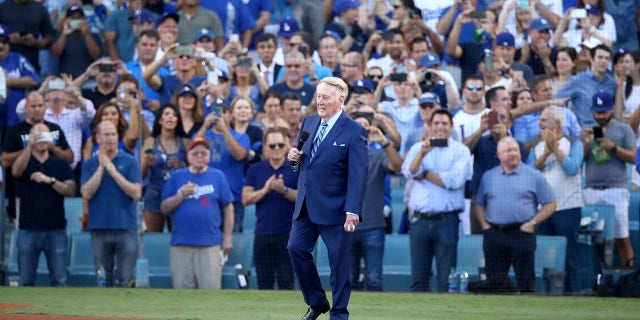 Former Los Angeles Dodgers broadcaster Vin Scully addresses fans before game two of the 2017 World Series between the Houston Astros and the Los Angeles Dodgers at Dodger Stadium on October 25, 2017 in Los Angeles.
