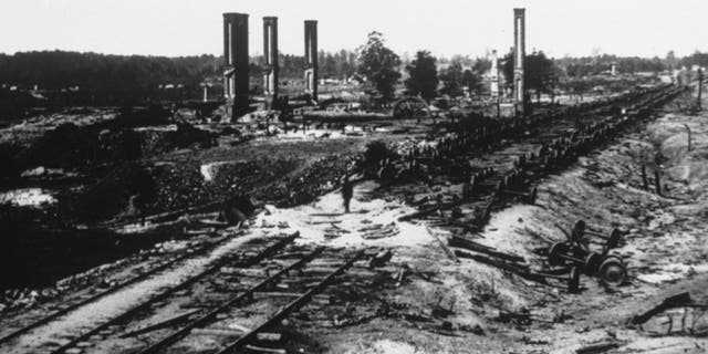 The ruins of Hood's 28-car ammunition train and the Scholfield rolling mill near Atlanta, Georgia, are shown on Sept. 1, 1864.