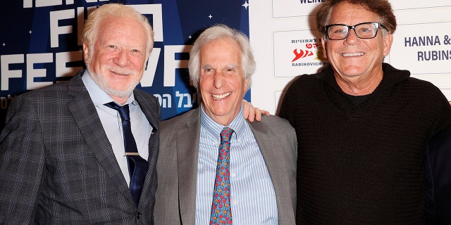 "Happy Days" stars Don Most, left, Henry Winkler, center, and Anson Williams. Williams calls his former "Happy Days" cast "family."