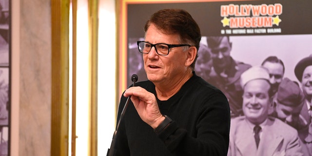 Actor/director Anson Williams speaks at a pre-Veterans Day tribute at the signing event for the book, "Dear Bob: Bob Hope's Wartime Correspondence with the G.I.s of World War II," at The Hollywood Museum, Nov. 4, 2021, in Hollywood, California. Williams served on the board of the United Service Organization as director of entertainment for troops overseas.