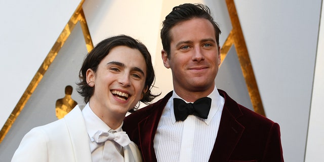 Timothée Chalamet, left, and Armie Hammer arrive for the 90th Annual Academy Awards on March 4, 2018, in Hollywood, California.