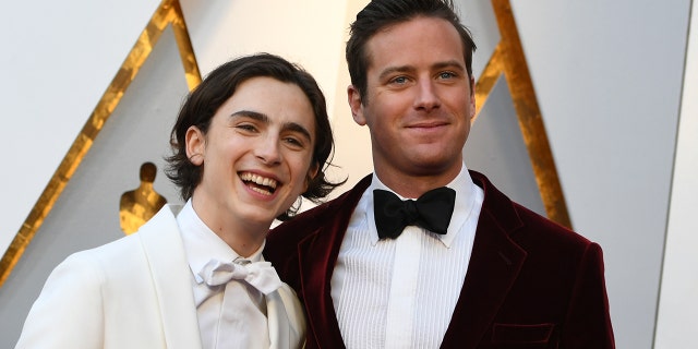 Timothée Chalamet, left, and Armie Hammer arrive for the 90th Annual Academy Awards on March 4, 2018, in Hollywood, California.