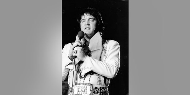 Elvis Presley in concert circa 1977. He would pass away that same year.