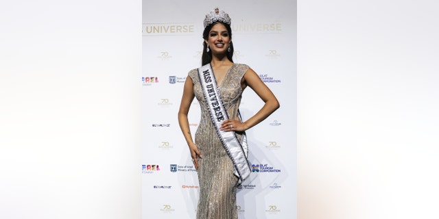 Miss Universe 2021 Harnaaz Sandhu (Miss India) poses for photos after winning the 70th Miss Universe beauty pageant in Israel's southern Red Sea city of Eilat on December 13, 2021. 