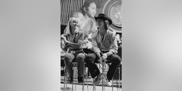 Olivia Newton-John and Andy Gibb at "The Music for UNICEF Concert: A Gift of Song," a benefit concert at the United Nations in New York City, circa 1979.