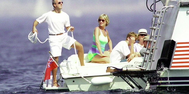 Diana, Princess of Wales, and son Prince William are seen holidaying with Dodi Al Fayed (not pictured) in Saint-Tropez in the summer of 1997, shortly before Diana and Dodi were killed in a car crash in Paris on August 31, 1997.