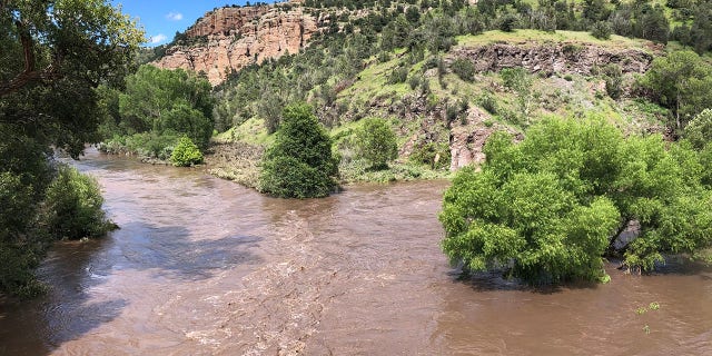 The Gila River crested at a record-breaking 30.28 feet on Sunday night near Virden, New Mexico, a town just 7 miles from Duncan, Arizona. The river water began spilling into Duncan early Monday, forcing mass evacuations.