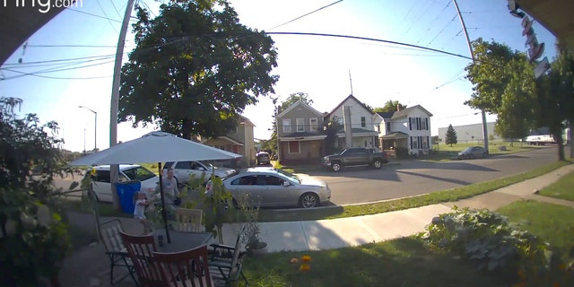 A six-year-old girl was seen pulling away from a man who grabbed her while she was taking out the trash, Tuesday, Aug. 23, 2022.