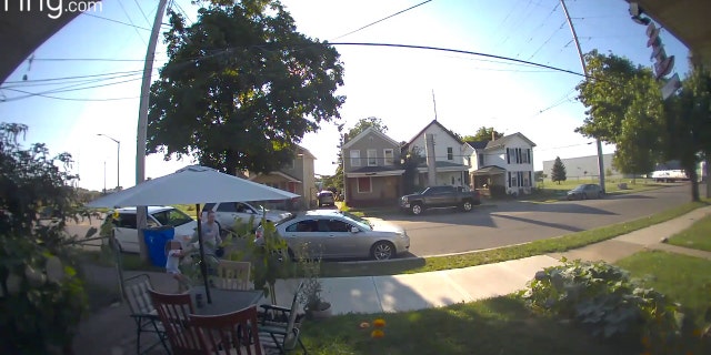 A six-year-old girl was seen pulling away from a man who grabbed her while she was taking out the trash, Tuesday, Aug. 23, 2022.