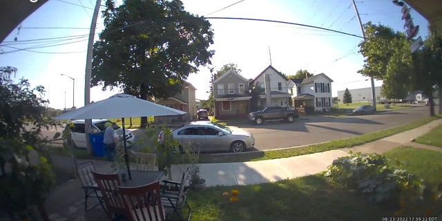 A six-year-old girl was seen pulling away from a man who grabbed her while she was taking out the trash, Tuesday, Aug. 23, 2022.